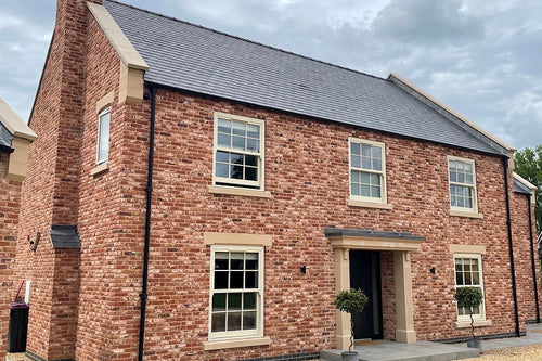 Traditional Brick and Stone Olde Althorne